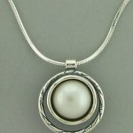 Surrounded Pearl Necklace